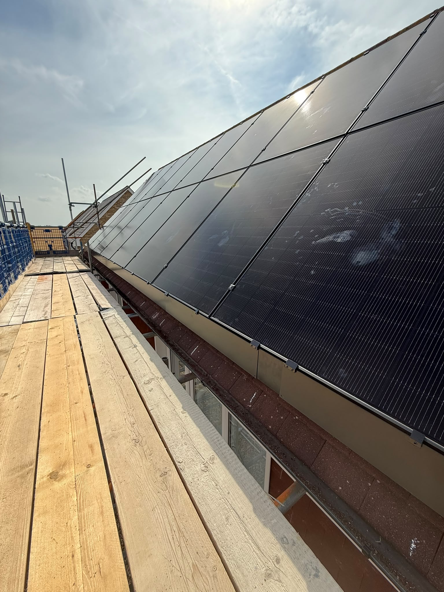Close view of the clean edge finish on a roof-mounted solar array